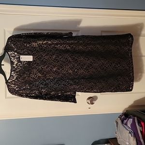 Colleen Lopez large sheer black dress